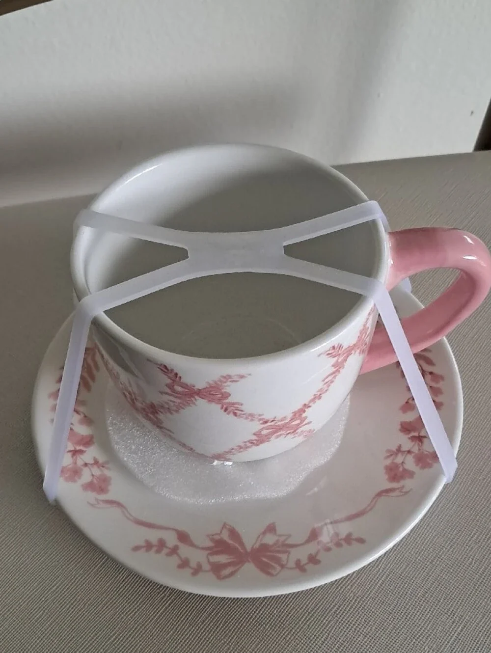 Pink and White Bow Ceramic Teacup and Saucer Set